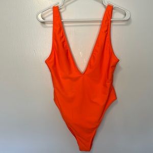 Neon orange one piece bathing suit
